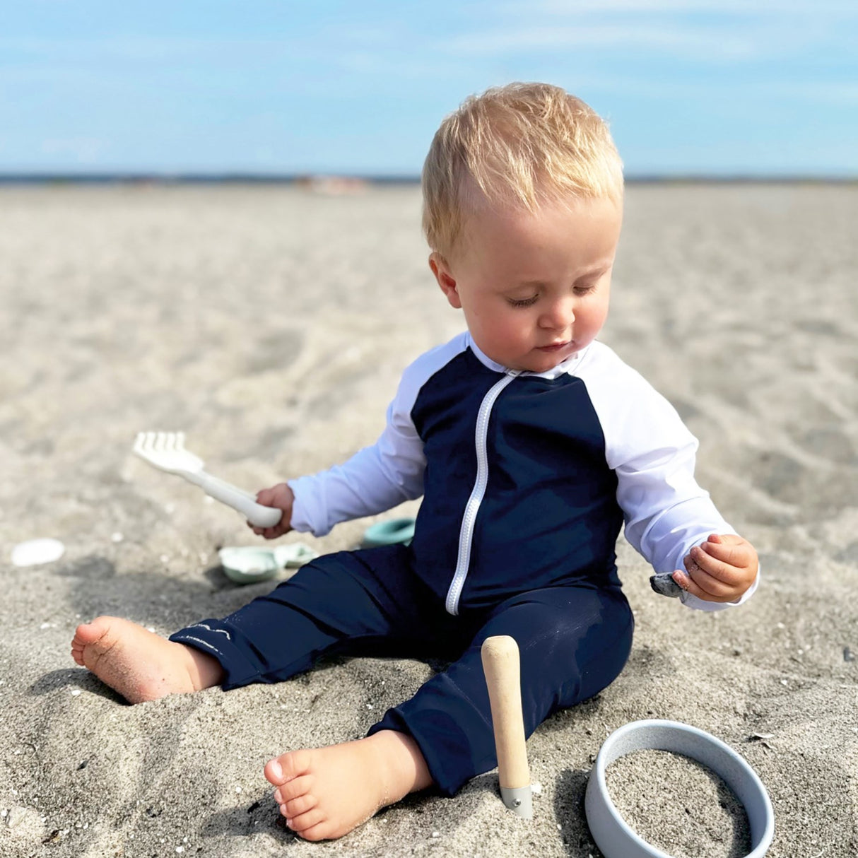 Petit Crabe Blue/White Multi Farge Sunsuit L/S