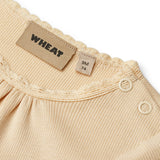 Wheat Macadamia Rib Body S/S Edna