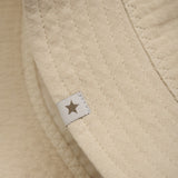 Huttelihut Irish Cream bøttehatt muslin