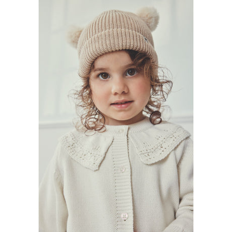 Huttelihut Irish Cream Lue Strikk m. Pompoms