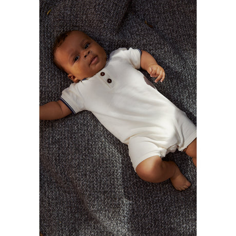 COPENHAGEN COLORS Cream Comb. Pique Polo Romper