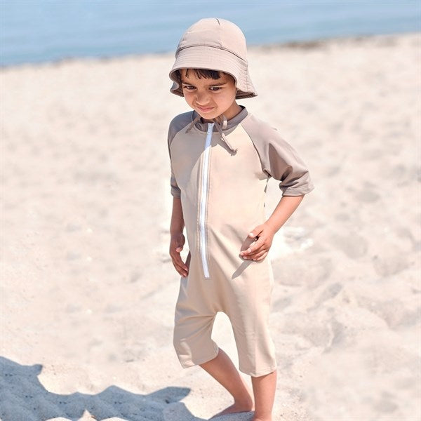 Petit Crabe Taupe Multicolor Heldrakt